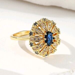 Elegant Gold and Blue Gemstone Ring